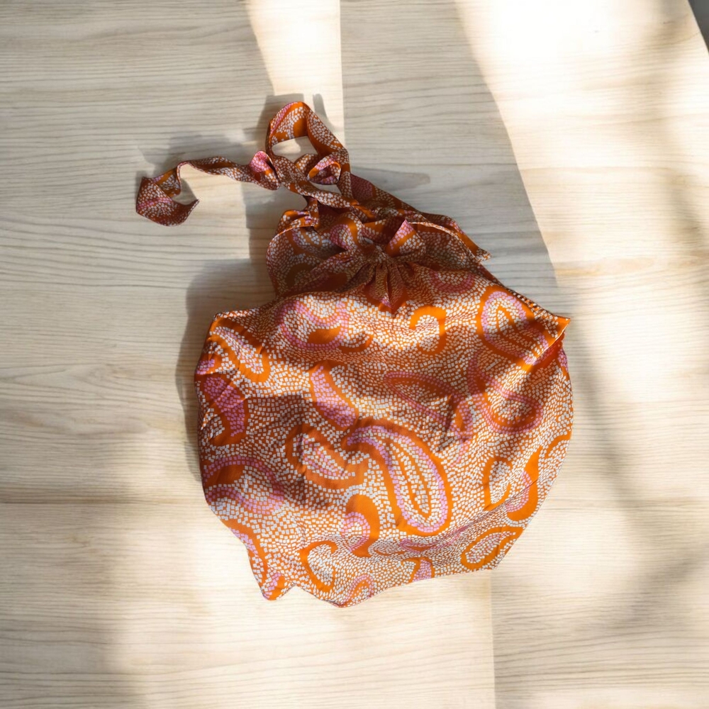 Vibrant Orange Patterned Top